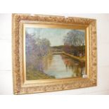A framed oil on board depicting a river scene signed WMC