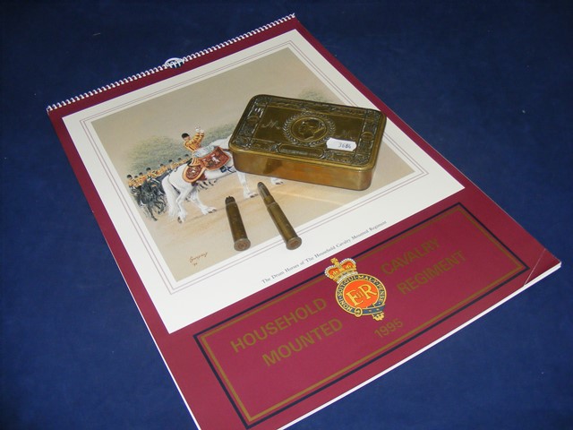 A WWI Christmas tin including a shell casing and pencil together with a 1995 Household Cavalry