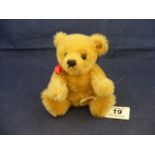 A small Steiff teddy bear