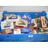 A carton containing a quantity of boxed diecast vehicles to include Days Gone By, Tetley,