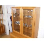 A glazed top Ercol dresser