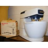 A kenwood mixer and accessories