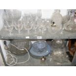 A large quantity of glassware on two shelves