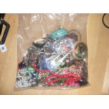 A sealed bag of costume jewellery