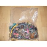 A sealed bag of costume jewellery