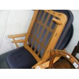 An ercol chair and matching footstool