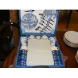 A brexston picnic set together with a small quantity of linen