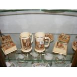 A quantity of Newhall Dickens ware mugs, trinket trays, lidded dishes including Oliver Twist,