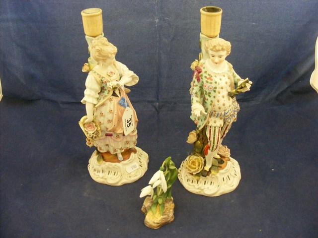 A pair of Sitzendorf candlestick figures together with a Royal Worcester snowdrop