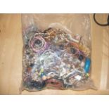 A sealed bag of costume jewellery