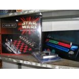 A Star Wars episode 1 chess set together with a Star Wars poker chips set etc.