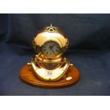 A reproduction divers helmet clock