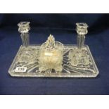 A glass dressing table set to include candlesticks