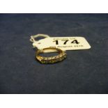 A Diamond and Peridot 9ct Gold ring size M