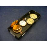 A collection of four pocket watches