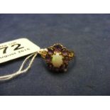 An Opal and Amethyst 9ct Gold Ring Size Q