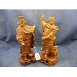 A pair of carved Chinese figures