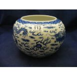 A Chinese blue and white bowl depicting dragons CONDITION REPORT: Approximately 16cm tall and 23cm