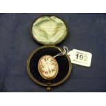 An 18ct gold cameo brooch boxed