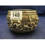 An ornate Indian unmarked tested silver pot depicting an Indian scene CONDITION REPORT: Dimensions