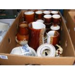 A quantity of Poole Pottery together with Royal Doulton etc.