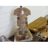 An Aztec style terracotta lamp