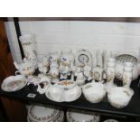 A quantity of Aynsley cottage garden decorative ceramics to include clock, vases,