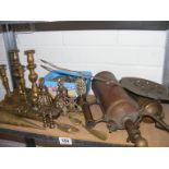 A quantity of metalware items to include horse brasses, candlesticks etc.