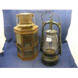 A pair of lamps one marked marine (Griffith & Son 1914)