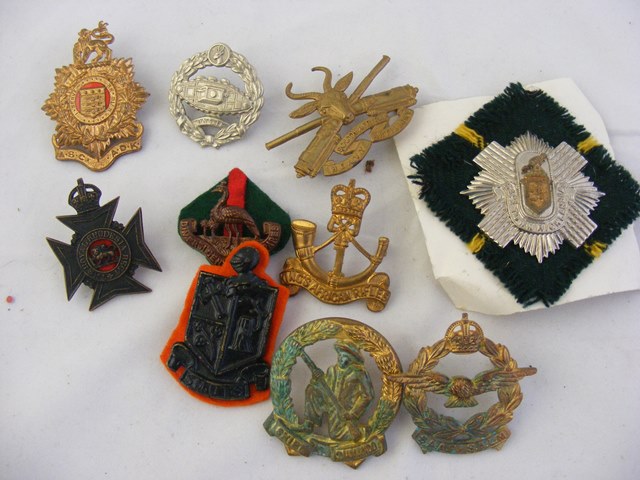 A selection of South African cap badges
