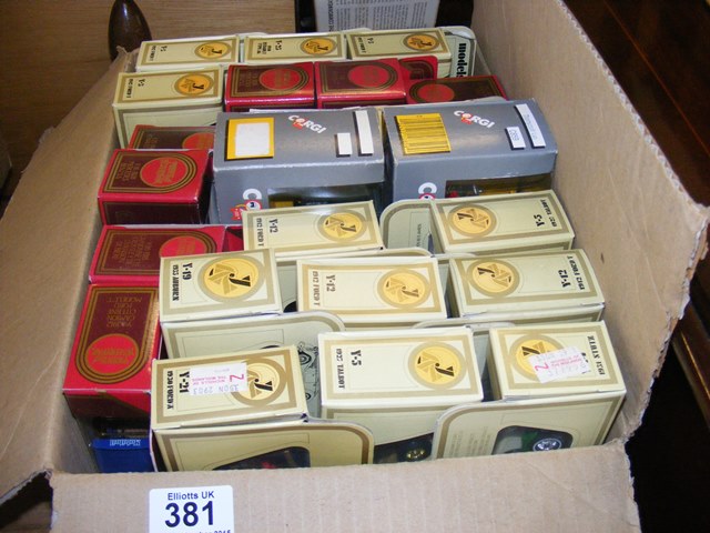 A carton of 27 boxed assorted die cast vehicles to include Lledo, Corgi,