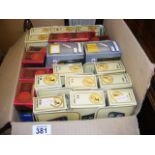 A carton of 27 boxed assorted die cast vehicles to include Lledo, Corgi,