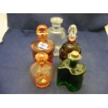 Five coloured glass decanters