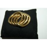 Broche en or 18K. Poids : 15,8 g