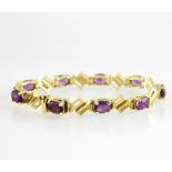 Armband GG 18 K mit 9 Amethysten. Länge ca. 17,5 - 18,0 cm. * Leg. 750/000 * Gew. 23,3 gAufrufpreis: