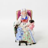 Seltenes Tintenzeug in Form einer Porzellanfigur, 19.Jh., ungemarkt. Sitzende ältere Dame, ein neben