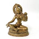 Bodhisattvi Tara aus Messing. TIBET, 20. Jh. auf einem Lotustrohn sitzend dargestellt,
