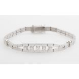 Opening: 660 EUR        Armband besetzt mit 5 Brillanten, zus. ca.0,45ct, TCR/ VSi. WG 18K, Länge