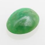 Opening: 130 EUR        1 loser, grüner Granat 3,987 cts. Cabochón oval. DEGEB-