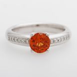 Damenring, bes. mit einem Spessartin (Granat) sowie zwölf Diam.-Brillanten zus. ca. 0,15ct FEINES