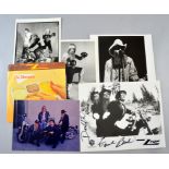 ZZ Top, a 10 x 8 photograph signed by all three members including Frank Beard, three other