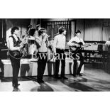 The Rolling Stones, Three 35mm negatives for a TV Special in 1964 showing the full band on stage,