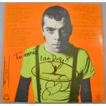 Ian Dury, New Boots And Panties, Vinyl LP album signed to back cover by Ian Dury with drawing of a