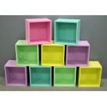 Nine painted storage boxes