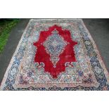 Persian blue ground carpet multiple borders, the centre decorated with repeating foliate forms,