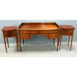 Mahogany and crossbanded bowfront knee hole desk with raised back, and a pair of mahogany bedside