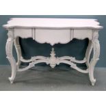 Painted serpentine side table with decorative carved support In good order, structurally sound,