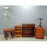 Stag three drawer bedside chest, two reproduction bookcases, mahogany wine table, nest of three