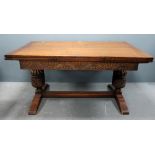 Oak draw leaf table on twin end bulbous supports united by stretcher 76cm x 152cm x 83cm, 258cm