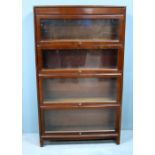 Oak and glazed four section bookcase